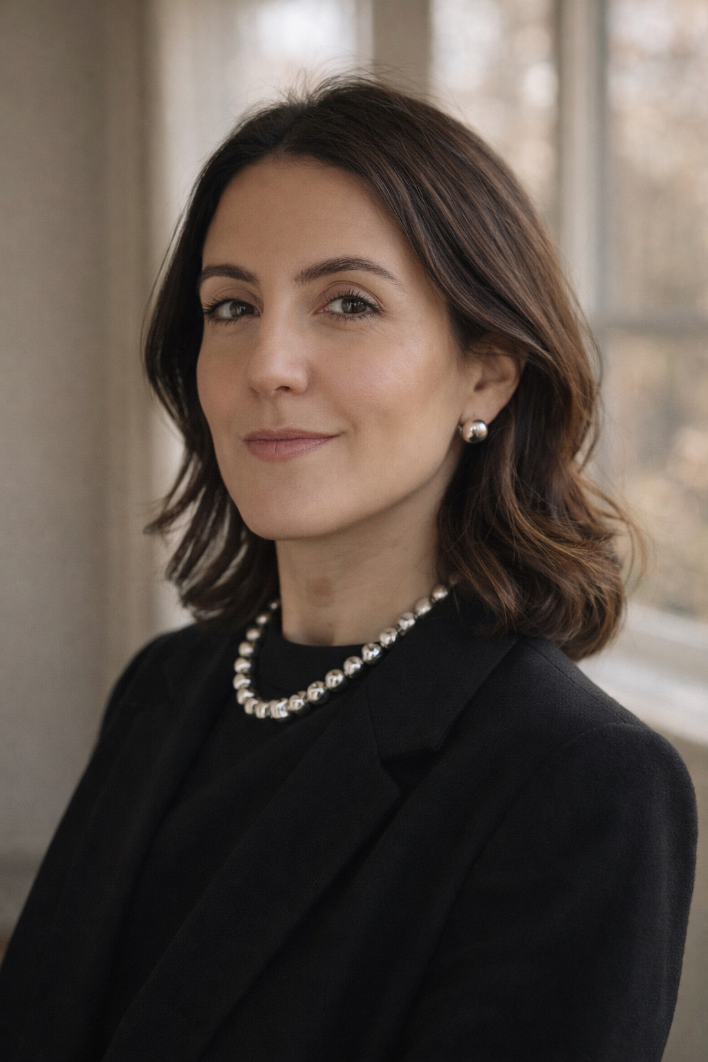 rofessional headshot of Constanza Oquendo, Greenwich CT real estate advisor focused on luxury and design-forward homes.